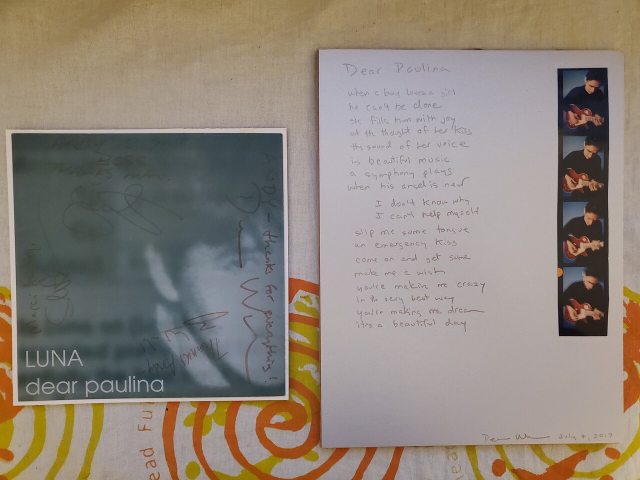 Signed sleeve and lyric sheet